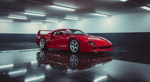 a red Ferrari in a garage