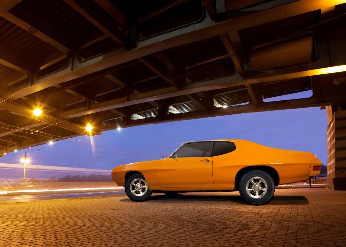 vintage car under the bridge