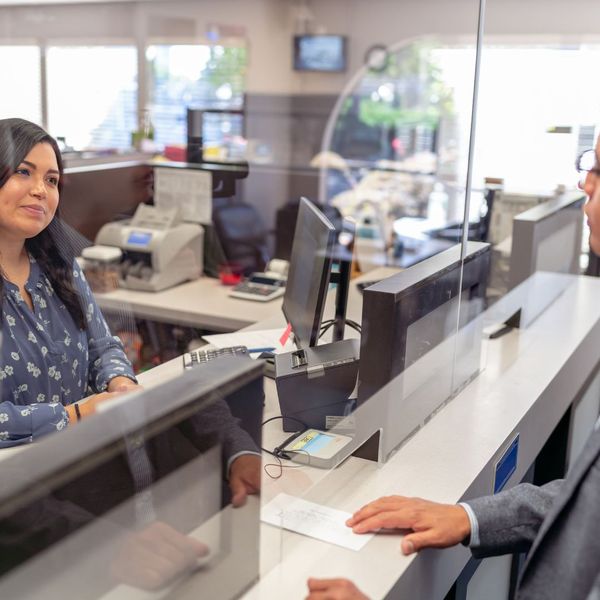 window between customer and woman