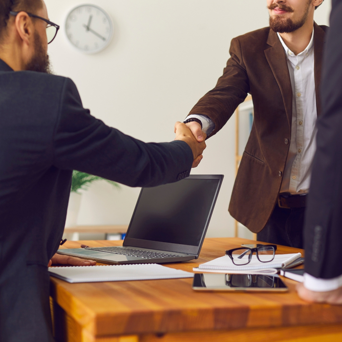 Two people shaking hands