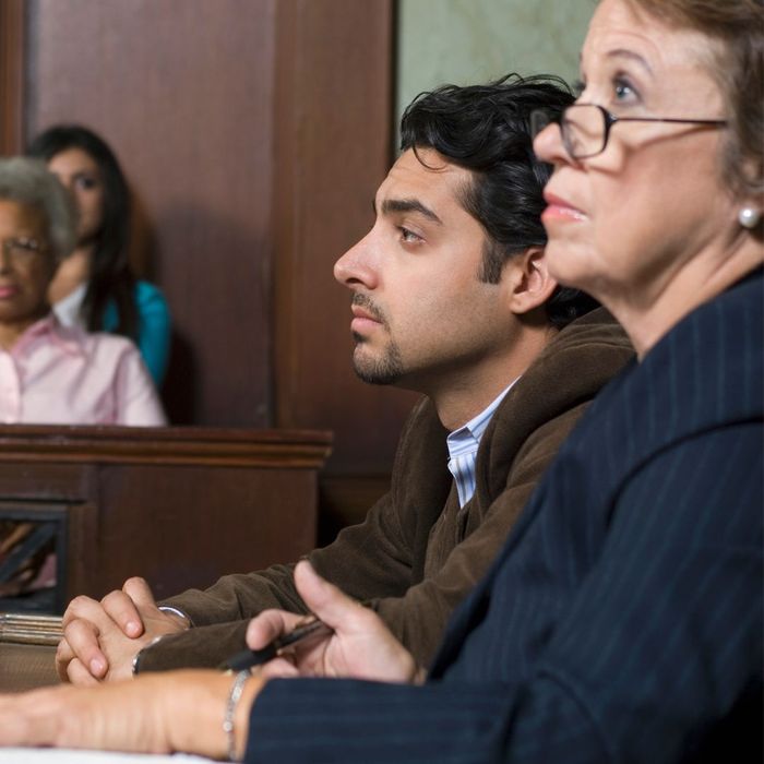 lawyer and client in court