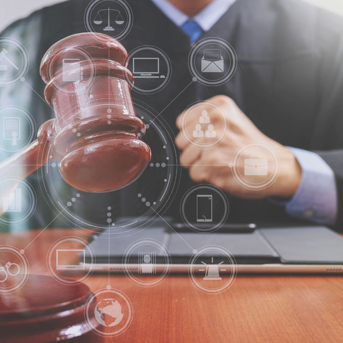 judge with digital legal icons overlaid over the gavel judge with digital legal icons overlaid over the gavel