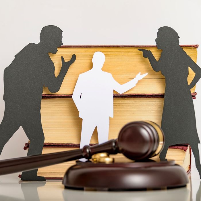 Cutouts of two people arguing