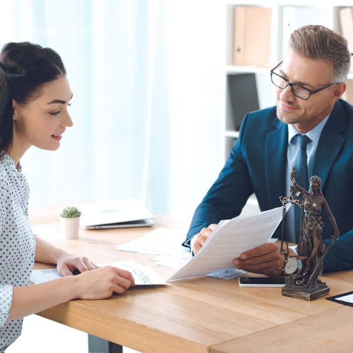 woman meeting with lawyer