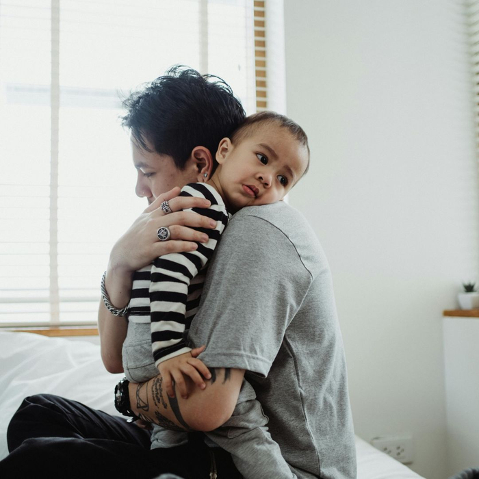 father holding toddler son father holding toddler son