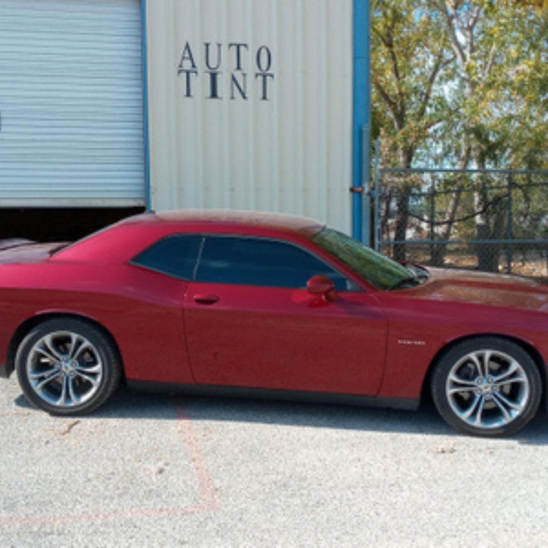 A vehicle with tinted windows.