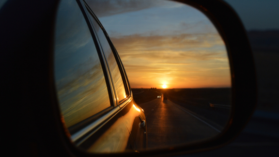 Sun in car mirror