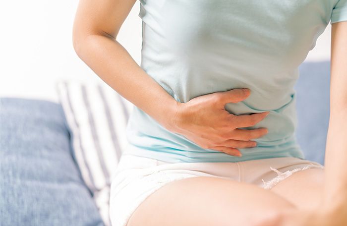 woman with stomach pain