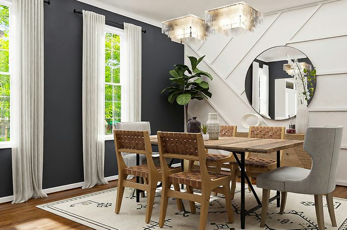 upscale dining room, angular pattern on wall and large round mirror