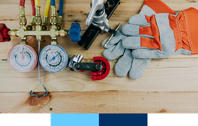 HVAC equipment on a wooden background.