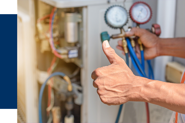 AC repairman inspecting unit