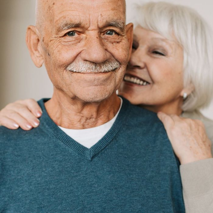 smiling elderly couple