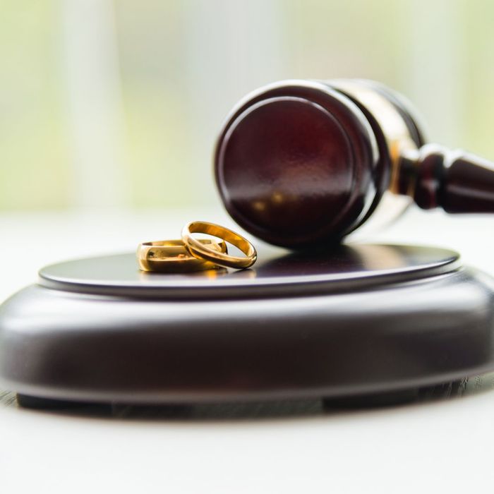 gavel with wedding bands