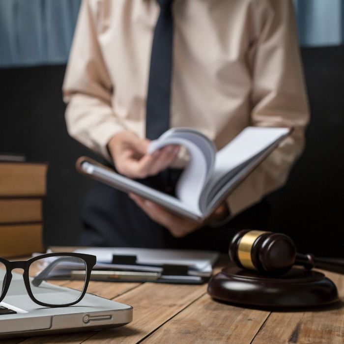 lawyer flipping through documents