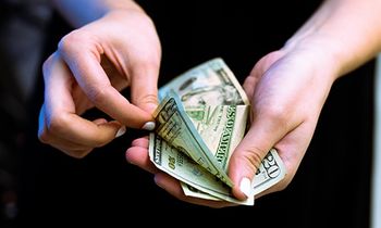 woman counting money