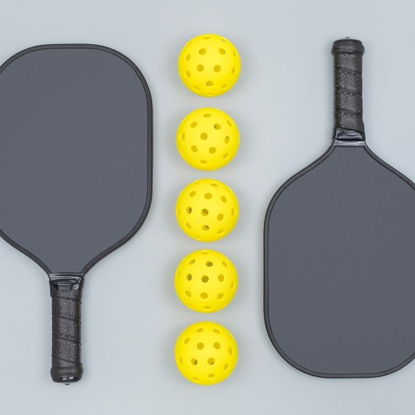 Pickleball paddles and balls