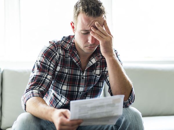 Man worried about foreclosure impacting credit score negatively.