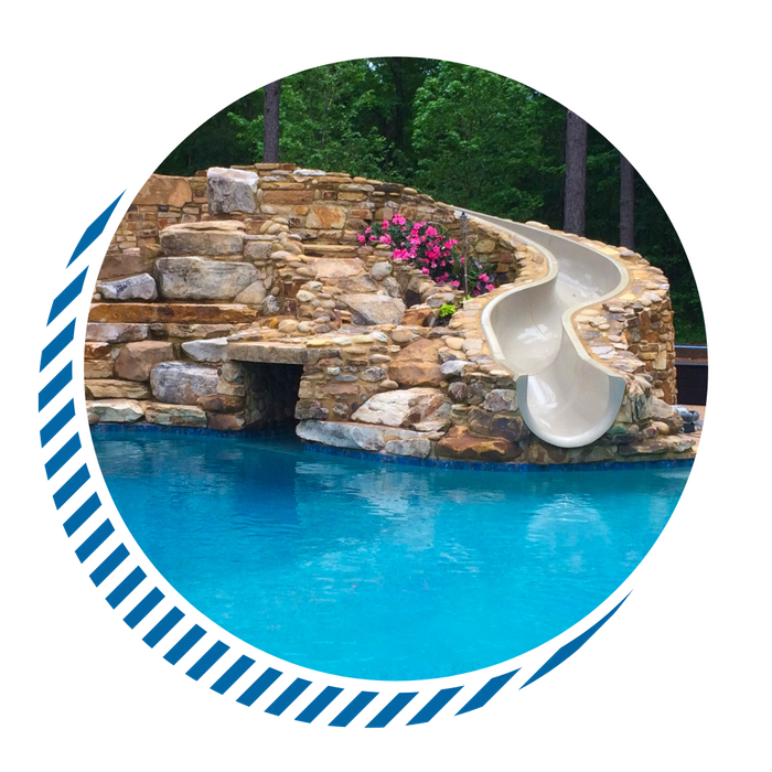 nice stonework around waterslide and pool