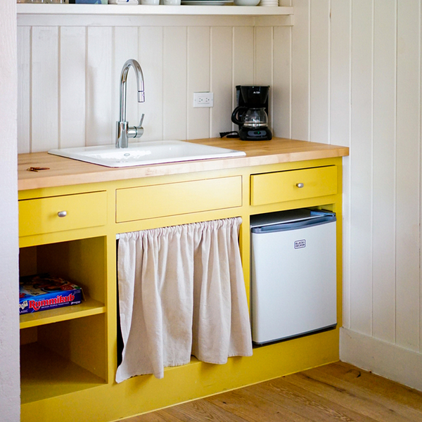 Kitchen with yellow cabinets