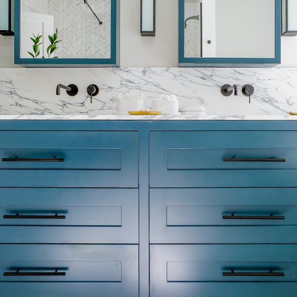 Bathroom with teal cabinets
