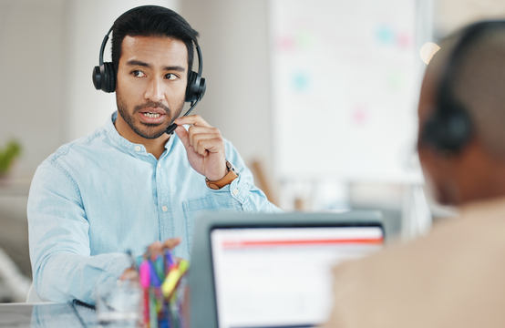 A customer service worker on the phone