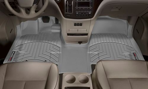 Overhead of car with aftermarket floor mats