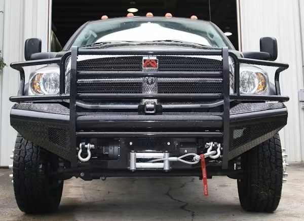 Pickup with replacement front bumper