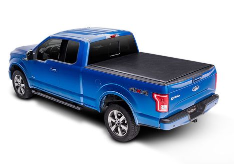 Blue truck with bed cover