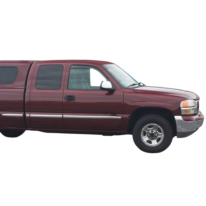 A Chevy pickup with a matching truck bed cover