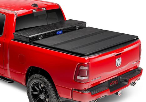 Red truck with bed cover
