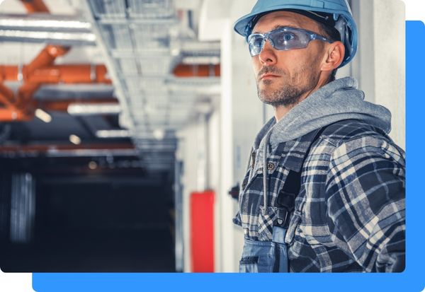 An HVAC technician in an industrial facility 