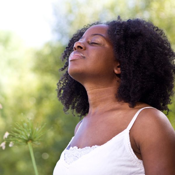 Women taking a deep breath