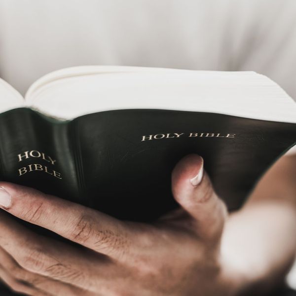 hands holding bible