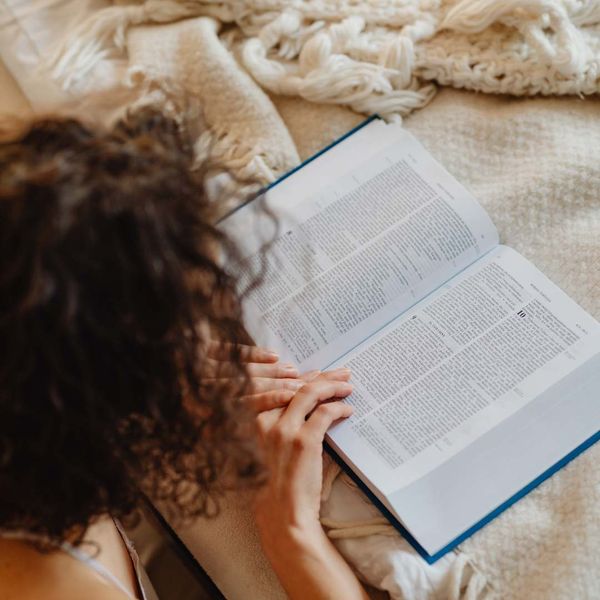 Woman reading the bible