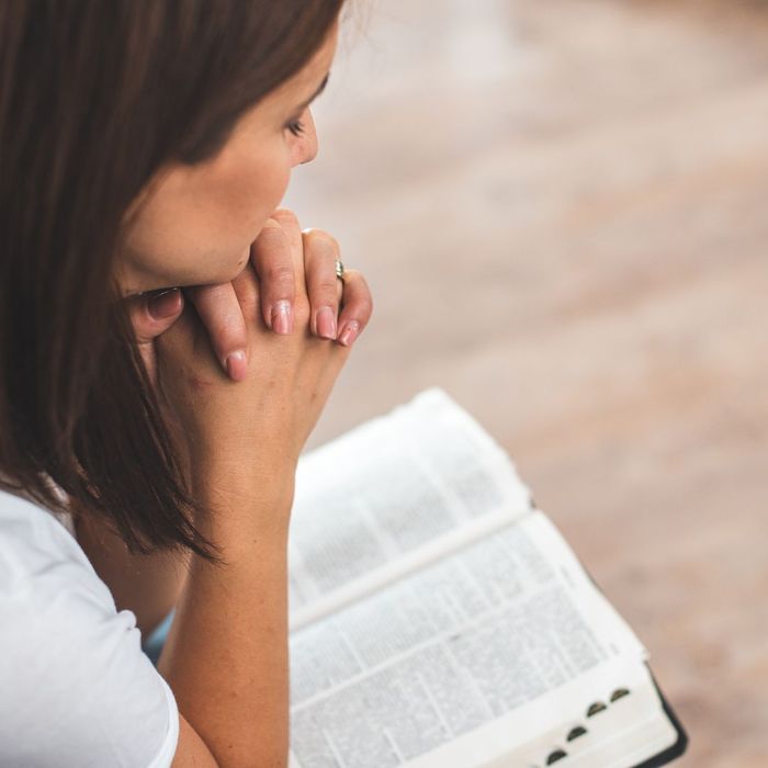 praying and reading bible