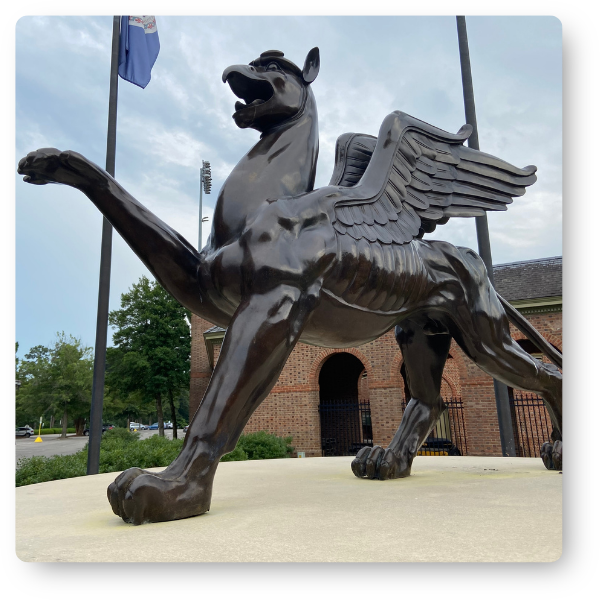 Statue of a creature on a school campus