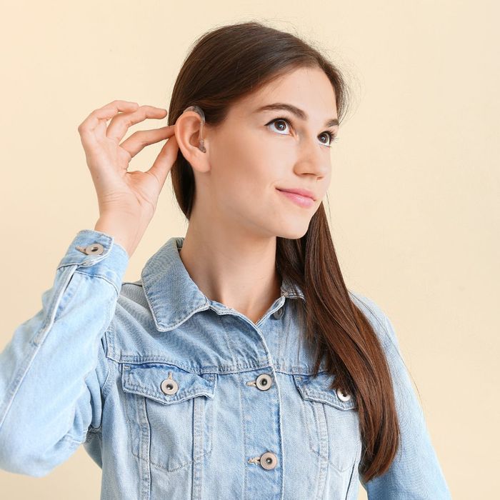 young woman with hearing aid
