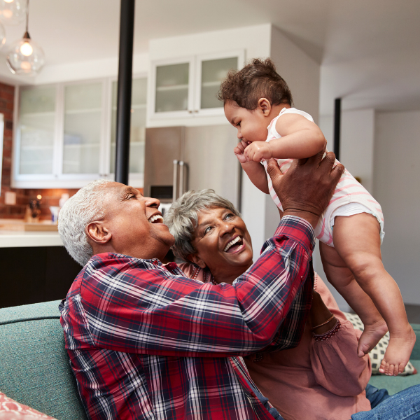 Two grandparents and their grandchild. Two grandparents and their grandchild.