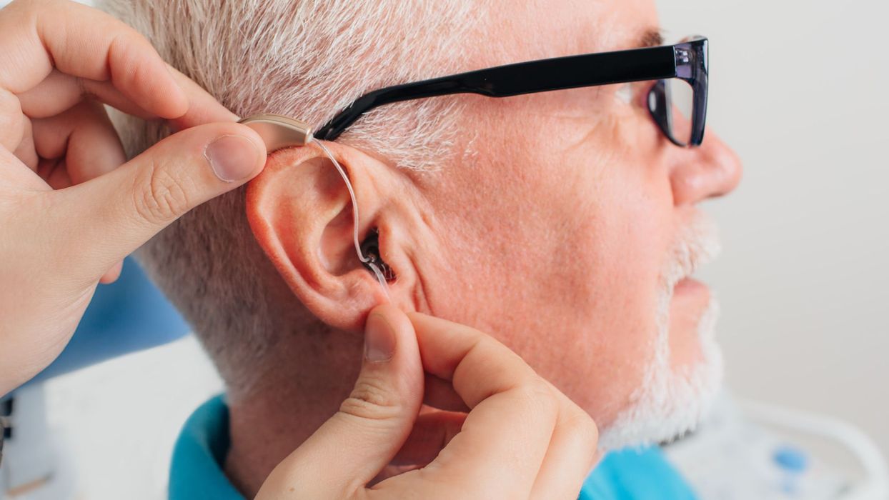 man getting a hearing aid