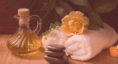 massage oil,stones,towels