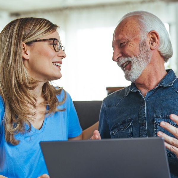 caregiver talking to a senior