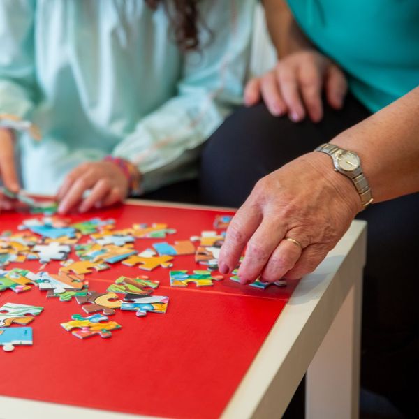 dementia senior working on a puzzle