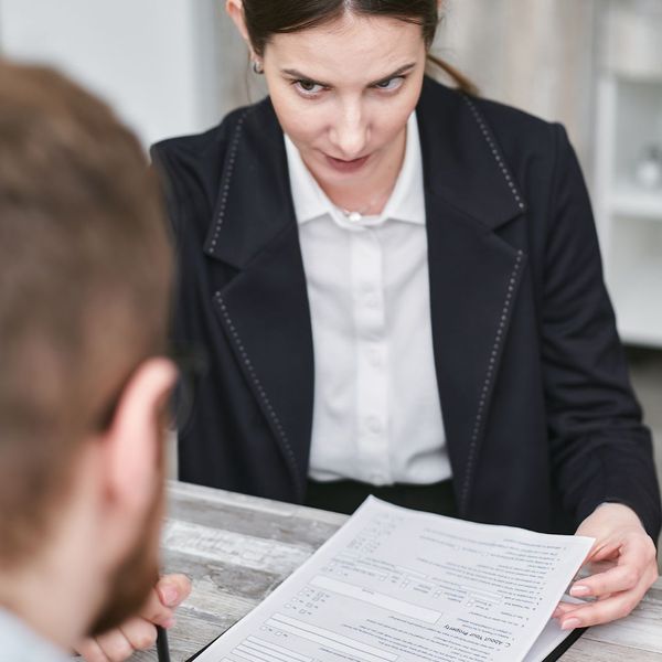 A woman going over a document