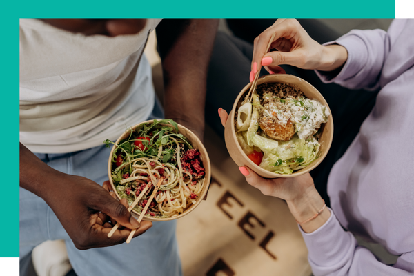 Two people eating healthy food Two people eating healthy food