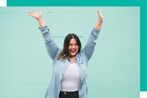 Happy woman with her arms in the air Happy woman with her arms in the air
