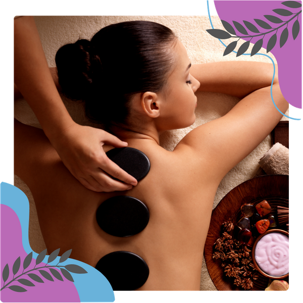 woman getting a hot stone massage