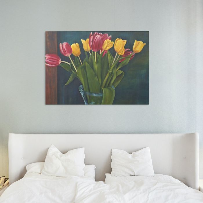 modern art painting of flowers, hanging above bed