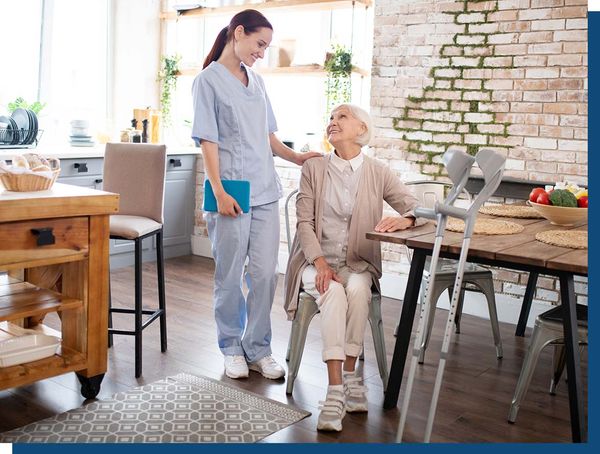 Caregiver checking up on patients home