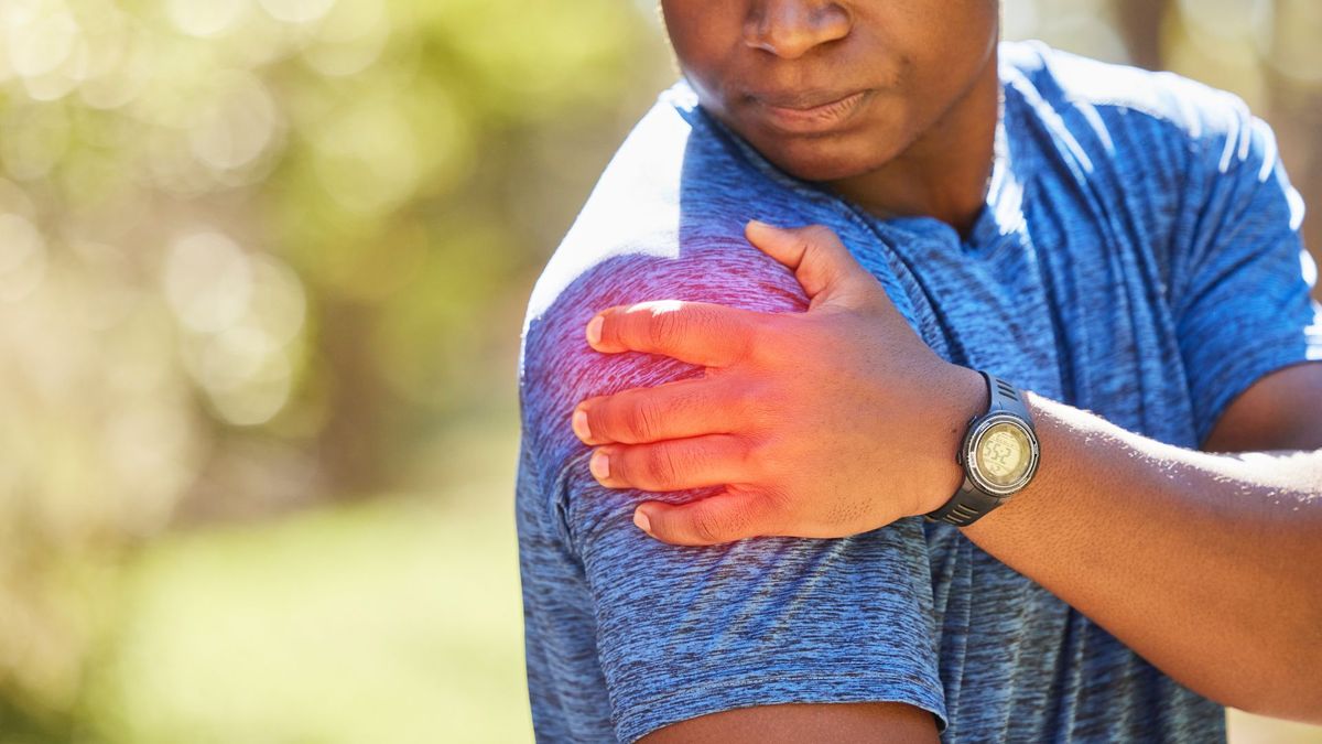 a man with burning shoulder pain