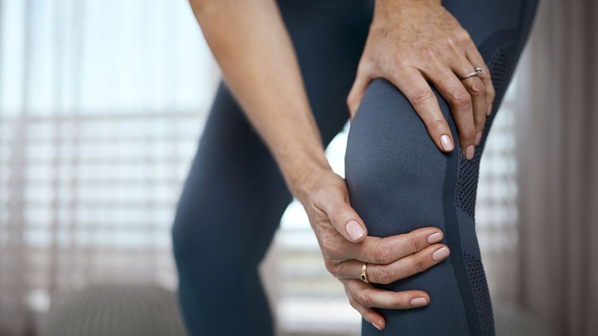 a woman with arthritic knee pain